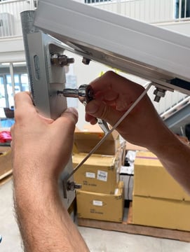 A person fixing a piece of metal

AI-generated content may be incorrect.